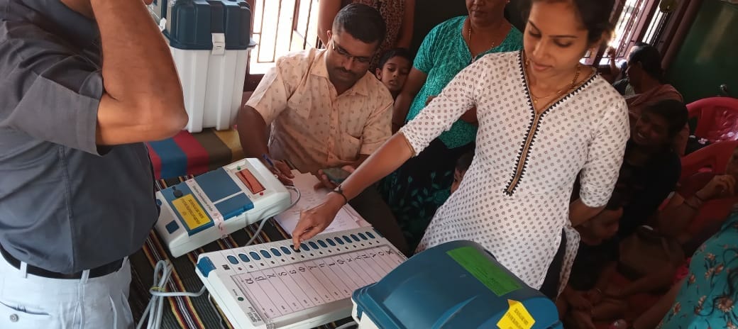 Voting at a polling booth