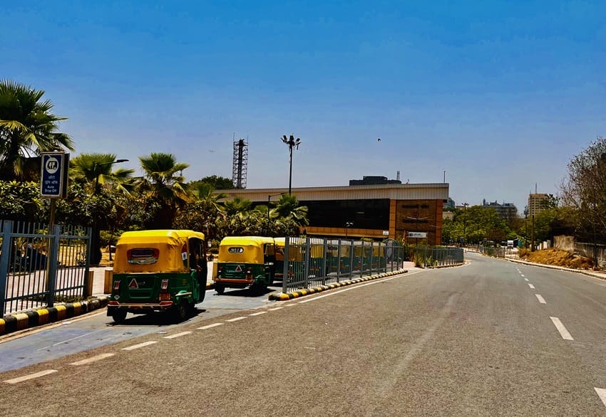 Auto rickshaws lined up, waiting for passengers as Delhi heats up. 