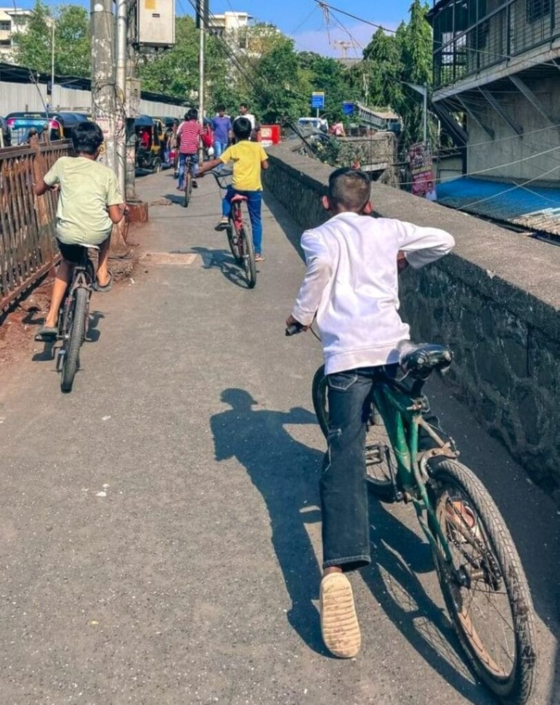 Young boys cycling in summer heat