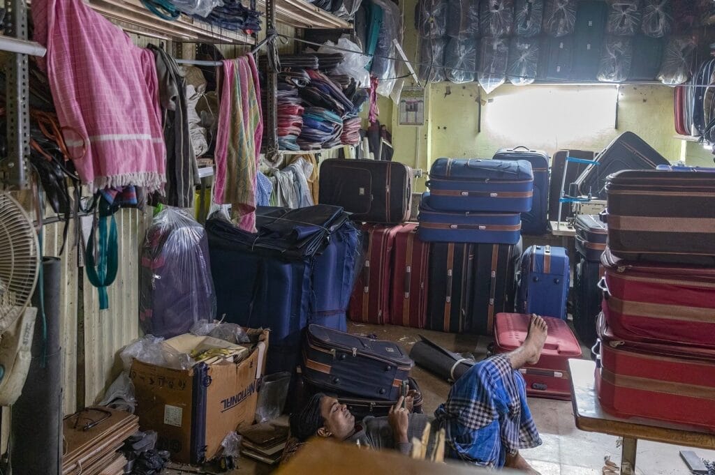 man resting in bag making unit