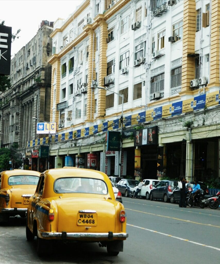 Street view of Park Street, with taxis on the road.