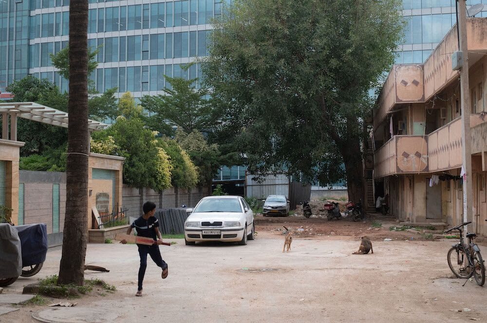 a child playing cricket outside APR